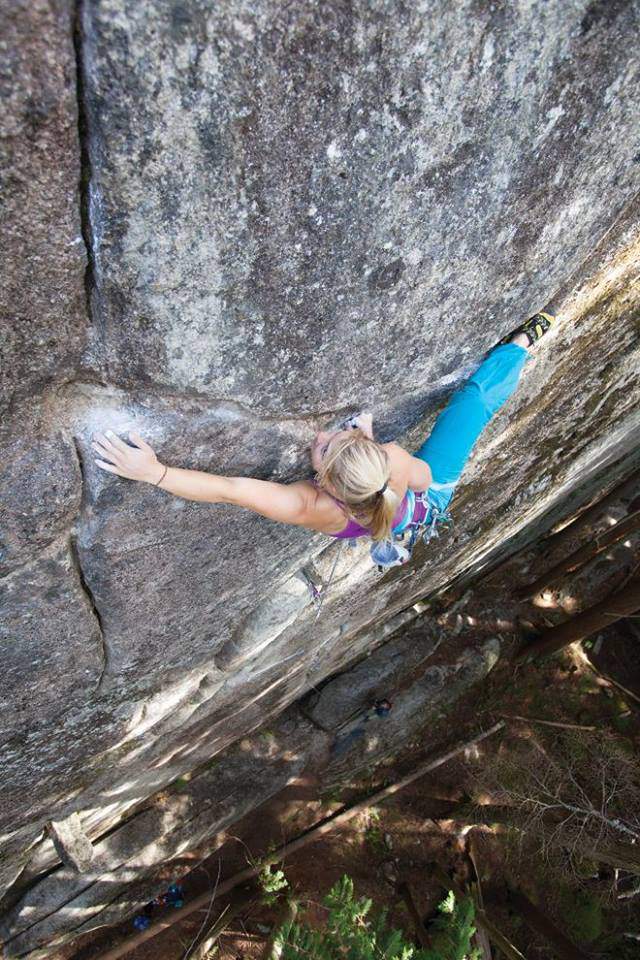 ClimbingGirls-07-Hazel Findlay stretches for the next hold on Adder Crack, her 5.13c R first ascent in Squamish, BC. Photo by Paul Bride
