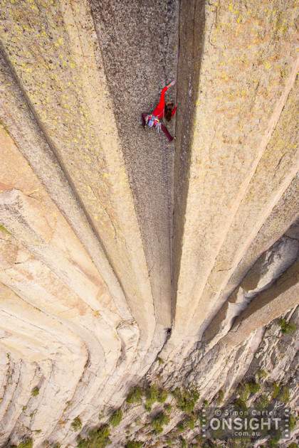 Brittany Griffith on Mr Clean (5.11a), one of the immaculate lines on Devils Tower, Wyoming, USA.